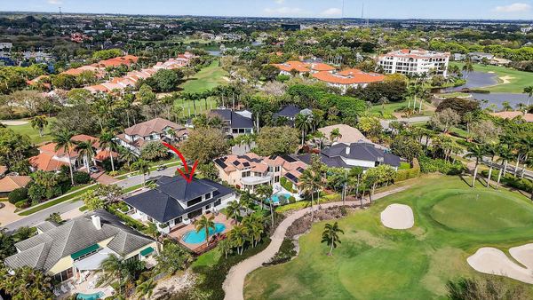 Aerial view of the home on the Boca Grove golf course, showing the pool, fairway and greens