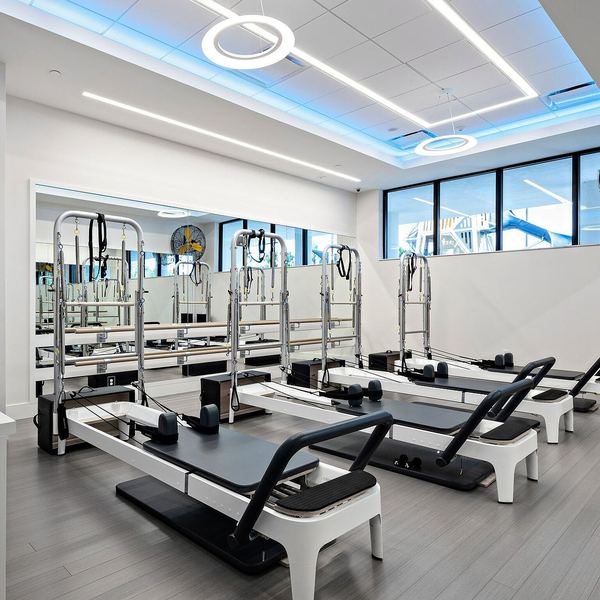 Club fitness studio with reformer machines
