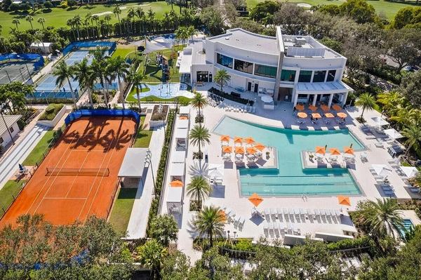 Aerial view of the clubhouse, pool and Har-Tru tennis court